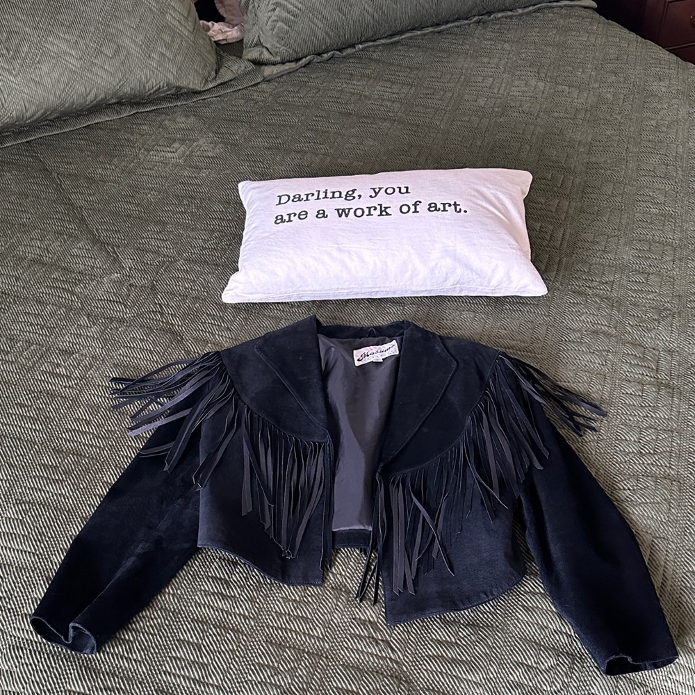 Vintage black leather jacket with fringe front and back!